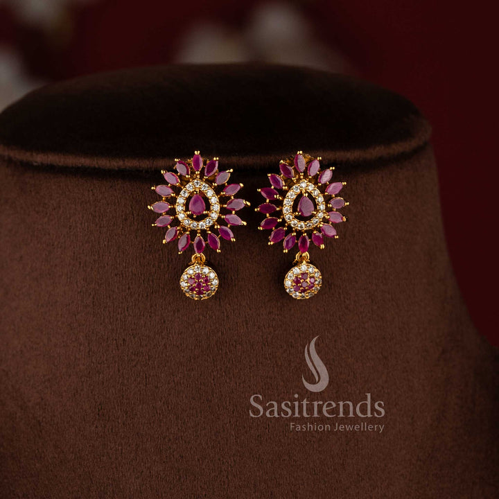 Elegant matte gold floral necklace set with white and ruby AD stones for festive and party wear