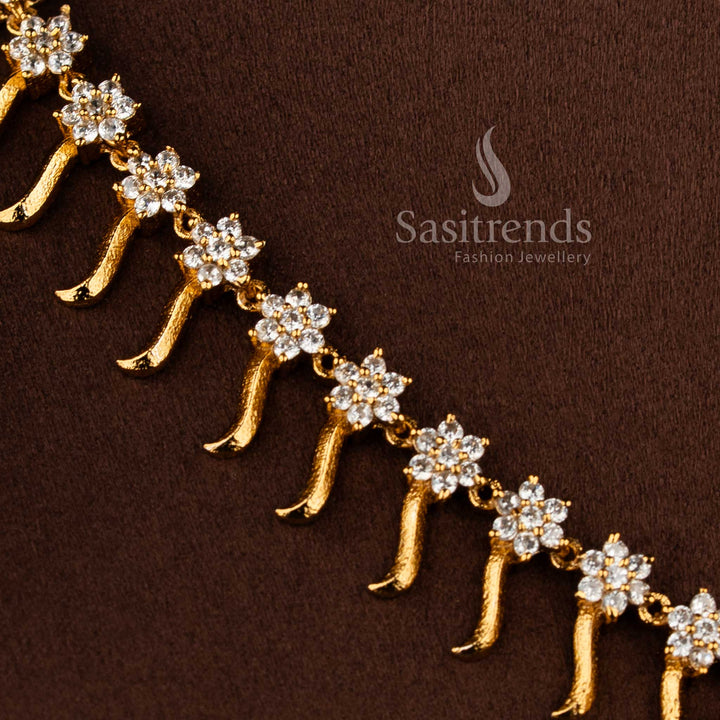 Traditional matte gold floral necklace jewellery set with white American diamond stones and matching earrings