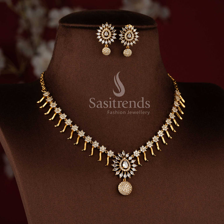 Gorgeous matte gold plated floral necklace jewellery set with white American diamond stones by Sasitrends.
