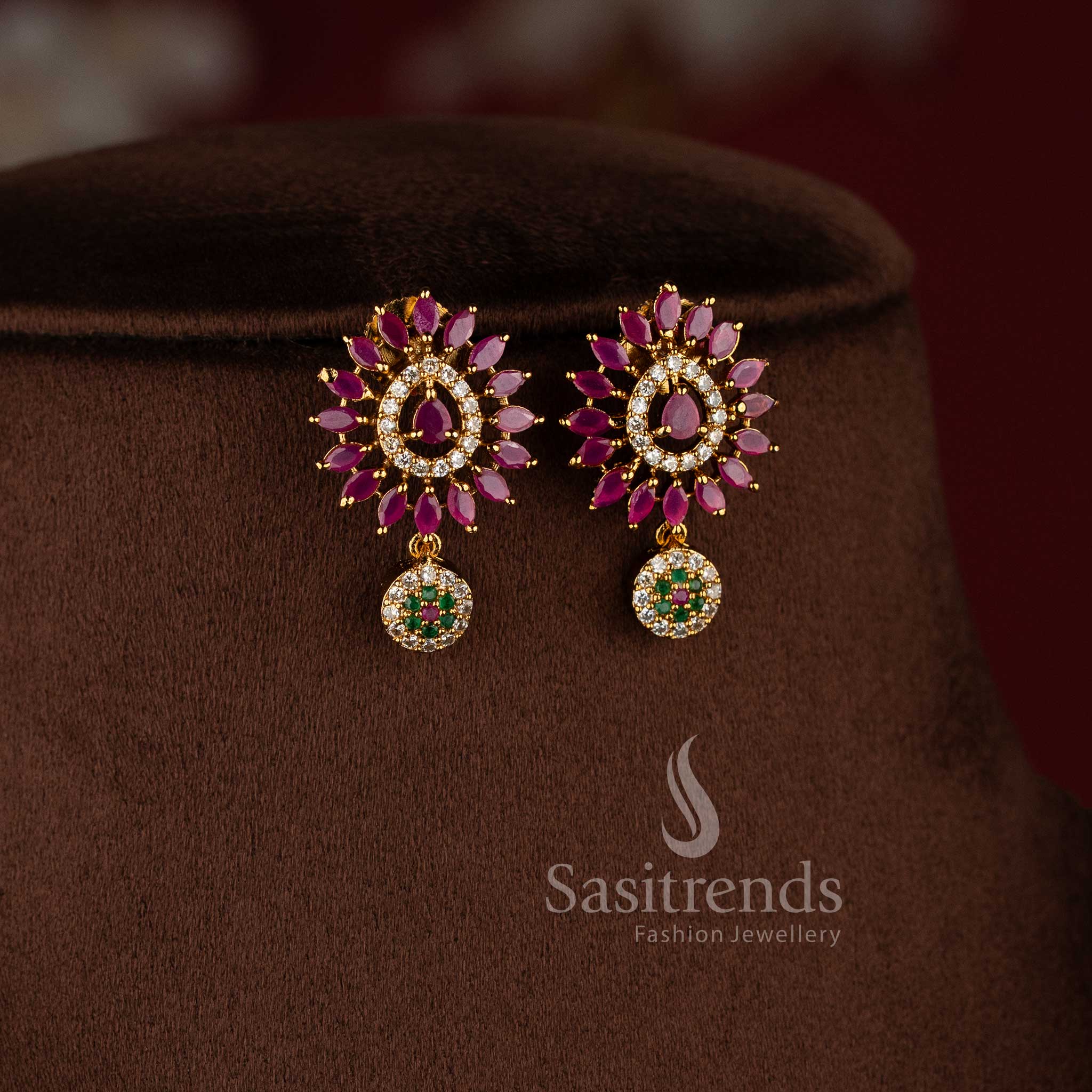 Elegant matte gold floral necklace set with multi color AD stones for festive and party wear.