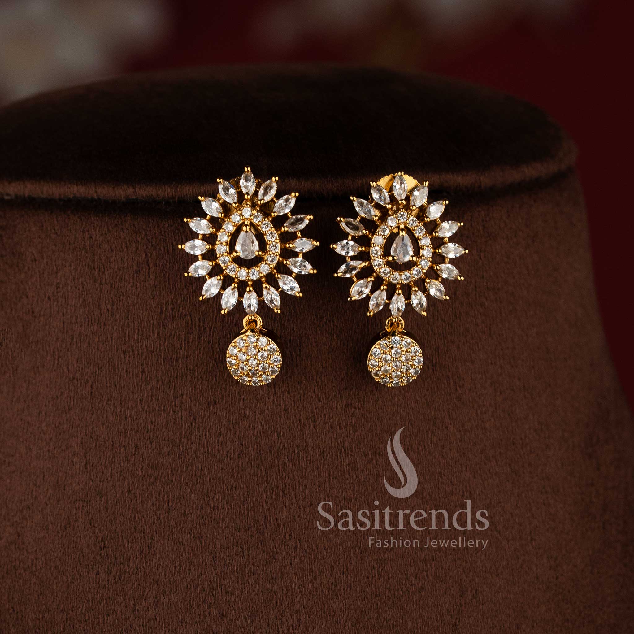 Traditional matte gold floral necklace jewellery set with white American diamond stones and matching earrings.
