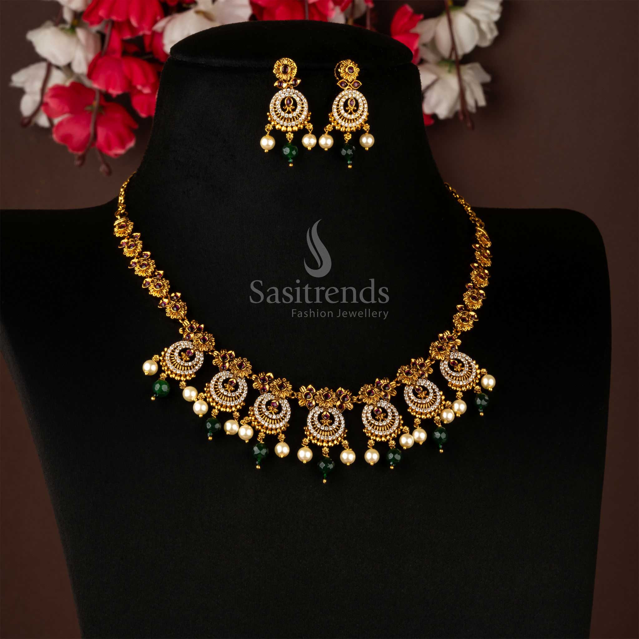 Ruby-white petal-inspired temple jewellery with AD sparkle and pearl accents, divine matte finish adding bridal grace and heritage lustre to traditional looks by Sasitrends