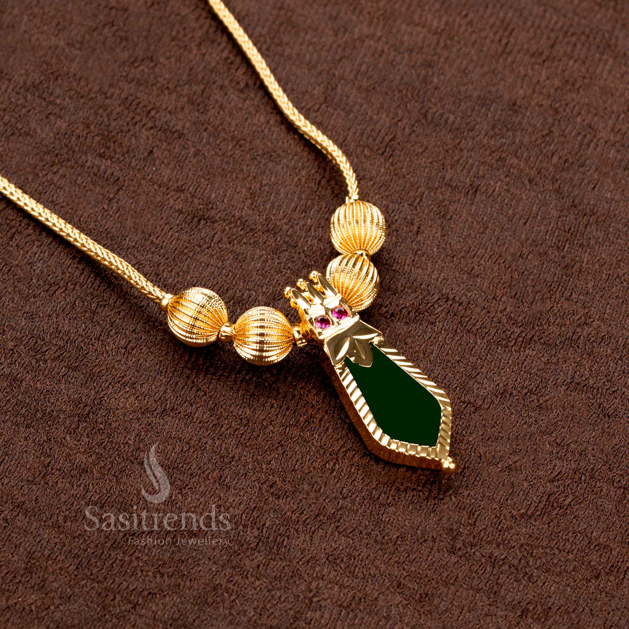 Heritage-style micro gold plated green Nagapadam Palakka necklace with intricate details and an adjustable chain, enhancing the elegance of ethnic wear - Sasitrends