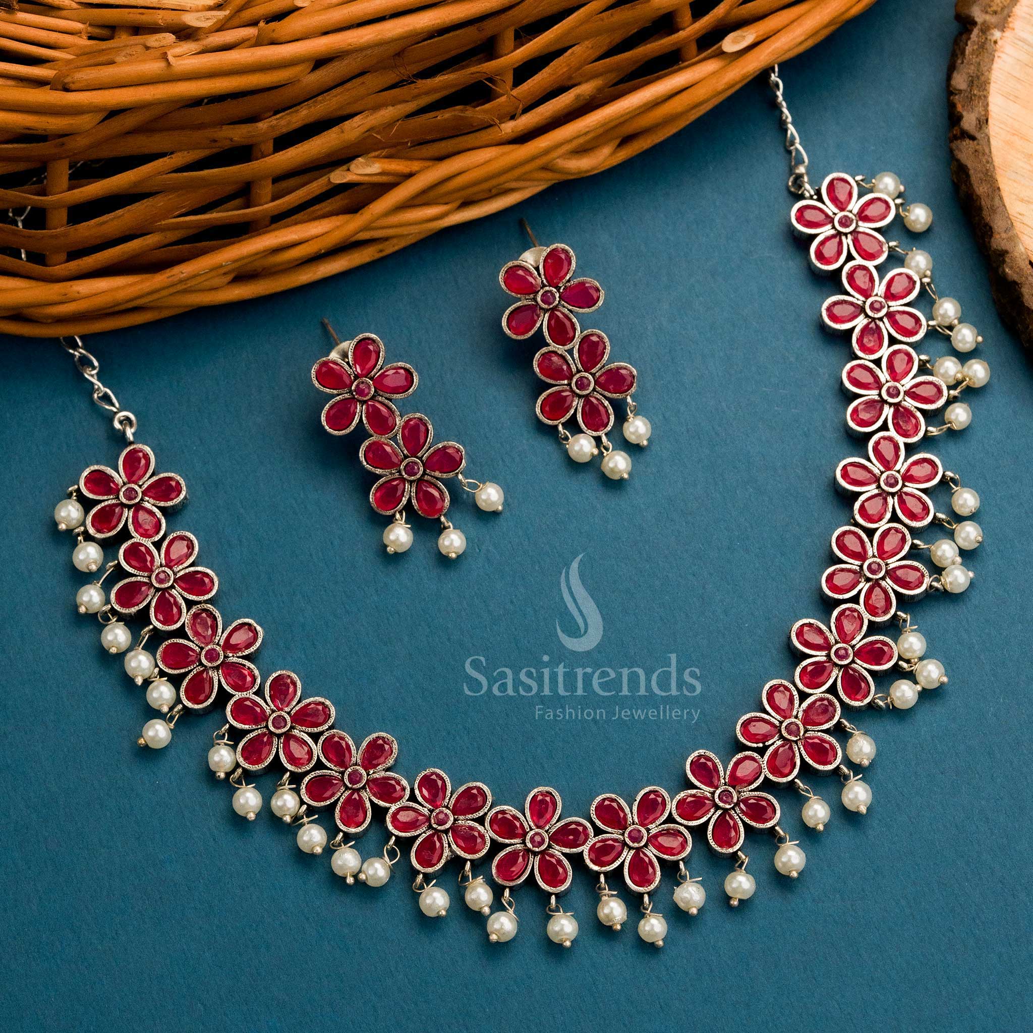 Ethnic oxidised necklace set in ruby tone with floral design, pearls and coordinated earrings – Sasitrends

