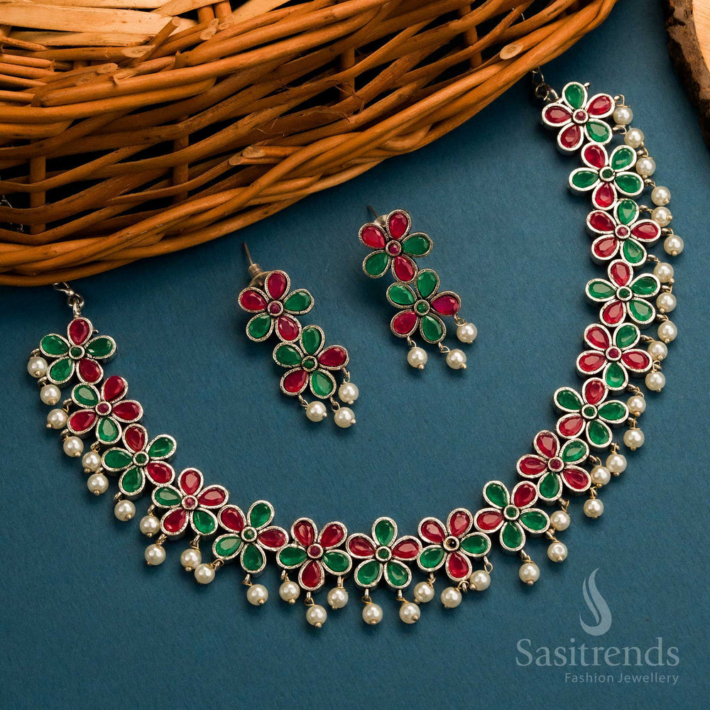 Dual tone ruby-green oxidised set with floral design and coordinated earrings for ethnic elegance – Sasitrends