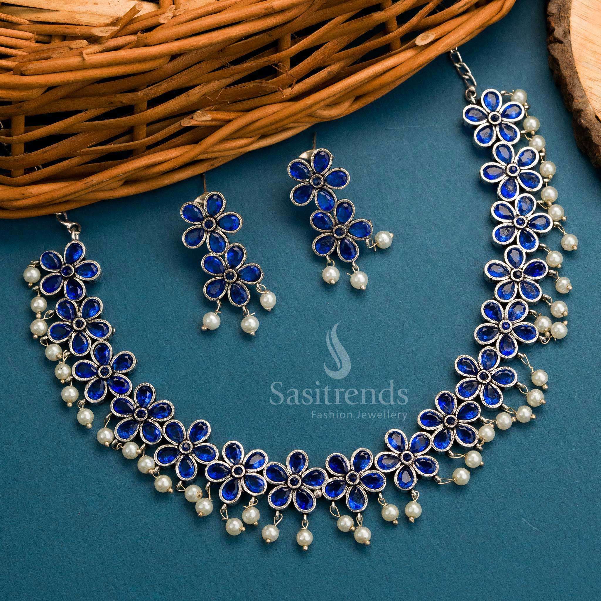 Blue oxidised floral necklace jewellery set with pearl embellishments and matching earrings – Sasitrends

