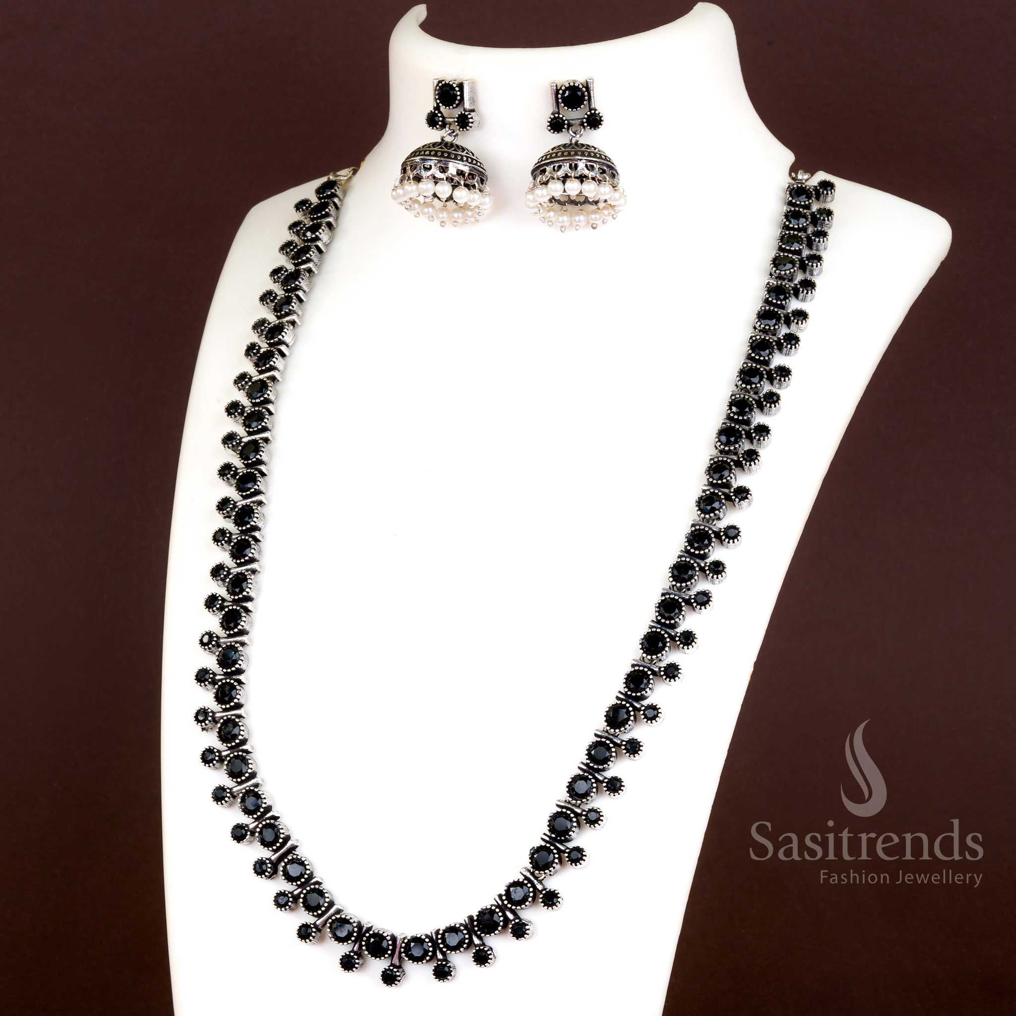 Elegant black oxidised silver necklace jewellery set with stone studs, pearls, and matching jhumkas – Sasitrends