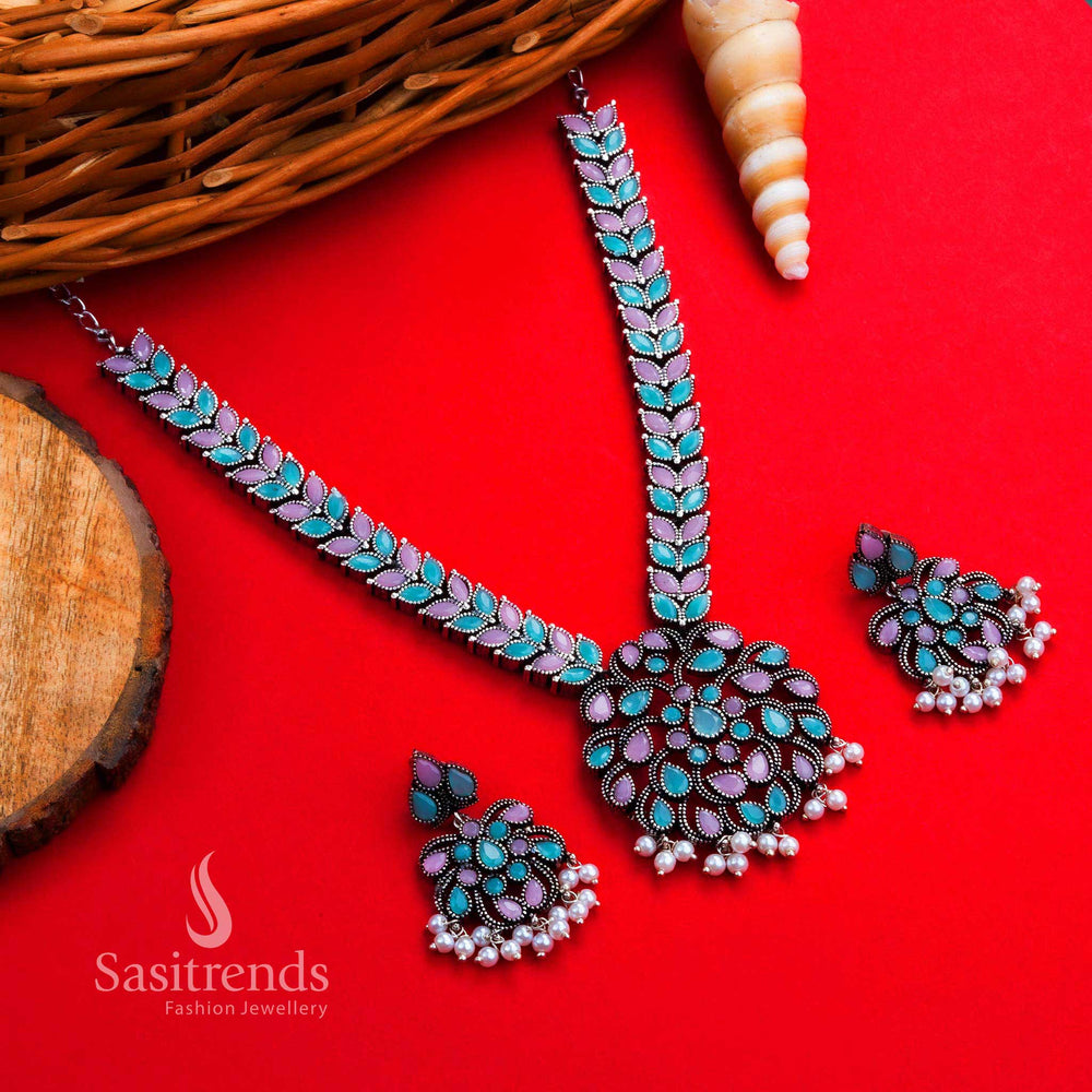 Fusion pink-mint oxidised floral pendant with leafy stone patterns and pearl earrings – perfect Navrathri jewellery blend of tradition and trend – Sasitrends