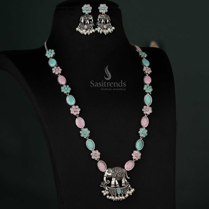 Charming oxidized necklace set with an elephant pendant and pearl drops in pink and mint, creating a whimsical and elegant look - Sasitrends