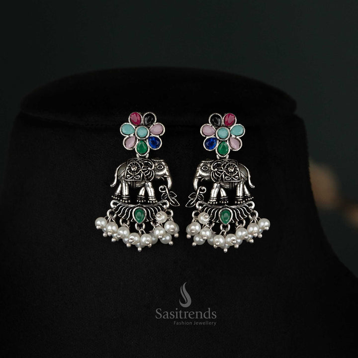 Delicate oxidized Earrings featuring an elephant pendant and pearl drops in rosy pink, radiating grace and feminine elegance - Sasitrends