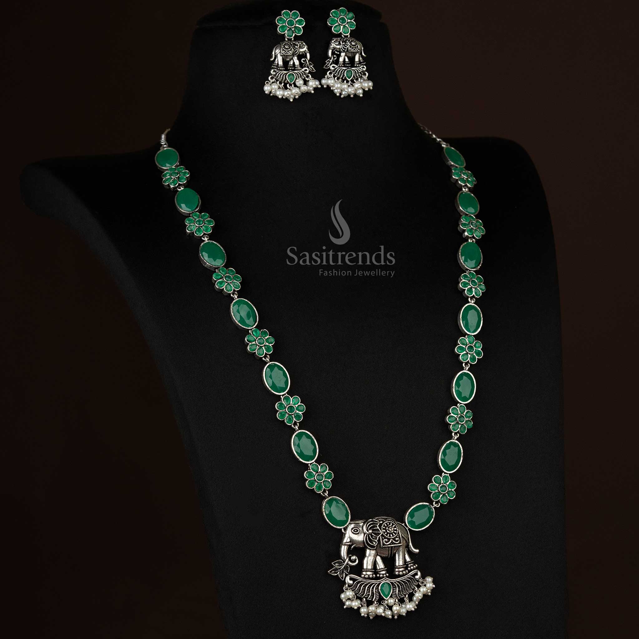 Elegantly crafted oxidized elephant pendant necklace with pearl drops in emerald green, a timeless choice for ethnic and modern outfits - Sasitrends