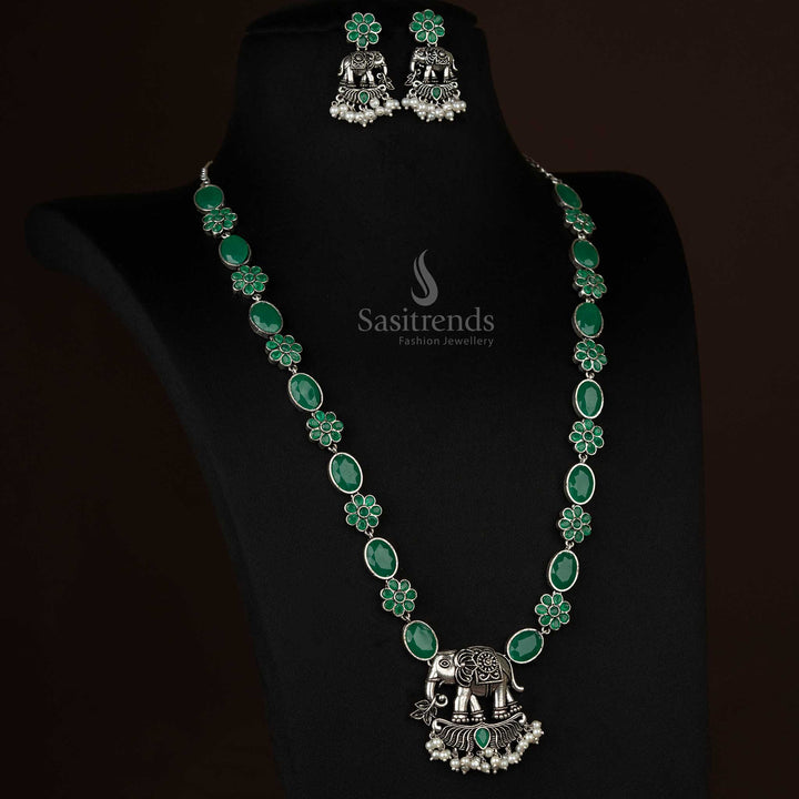 Elegantly crafted oxidized elephant pendant necklace with pearl drops in emerald green, a timeless choice for ethnic and modern outfits - Sasitrends