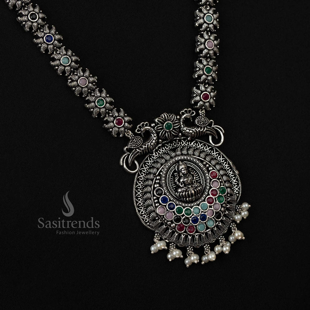 Elegant oxidized necklace with peacock and Lakshmi pendants and pearl drops in Multi, offering a graceful and feminine ethnic look - Sasitrends