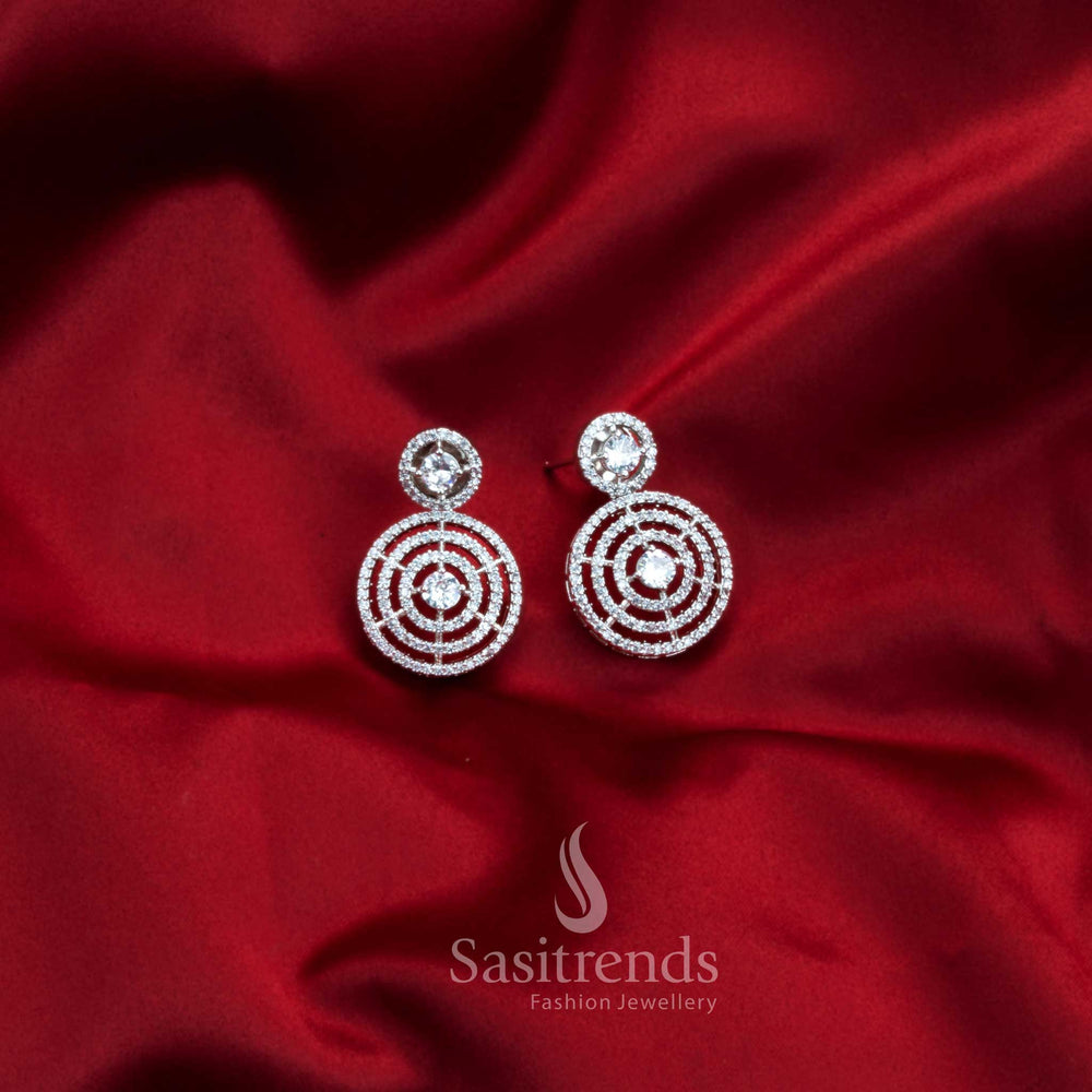 Halo Sparkle Charisma rhodium silver earrings with white AD stones in elegant circle motifs – glamorous white party jewellery – Sasitrends

