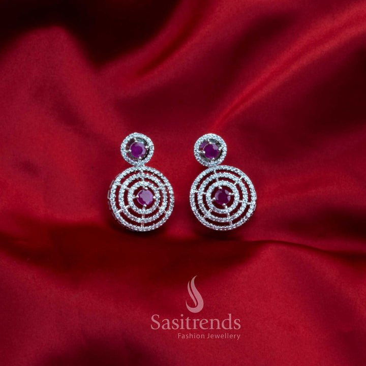 Crimson Orbit Shine rhodium-plated circle earrings with rich ruby American Diamonds – stylish partywear jewellery for women – Sasitrends