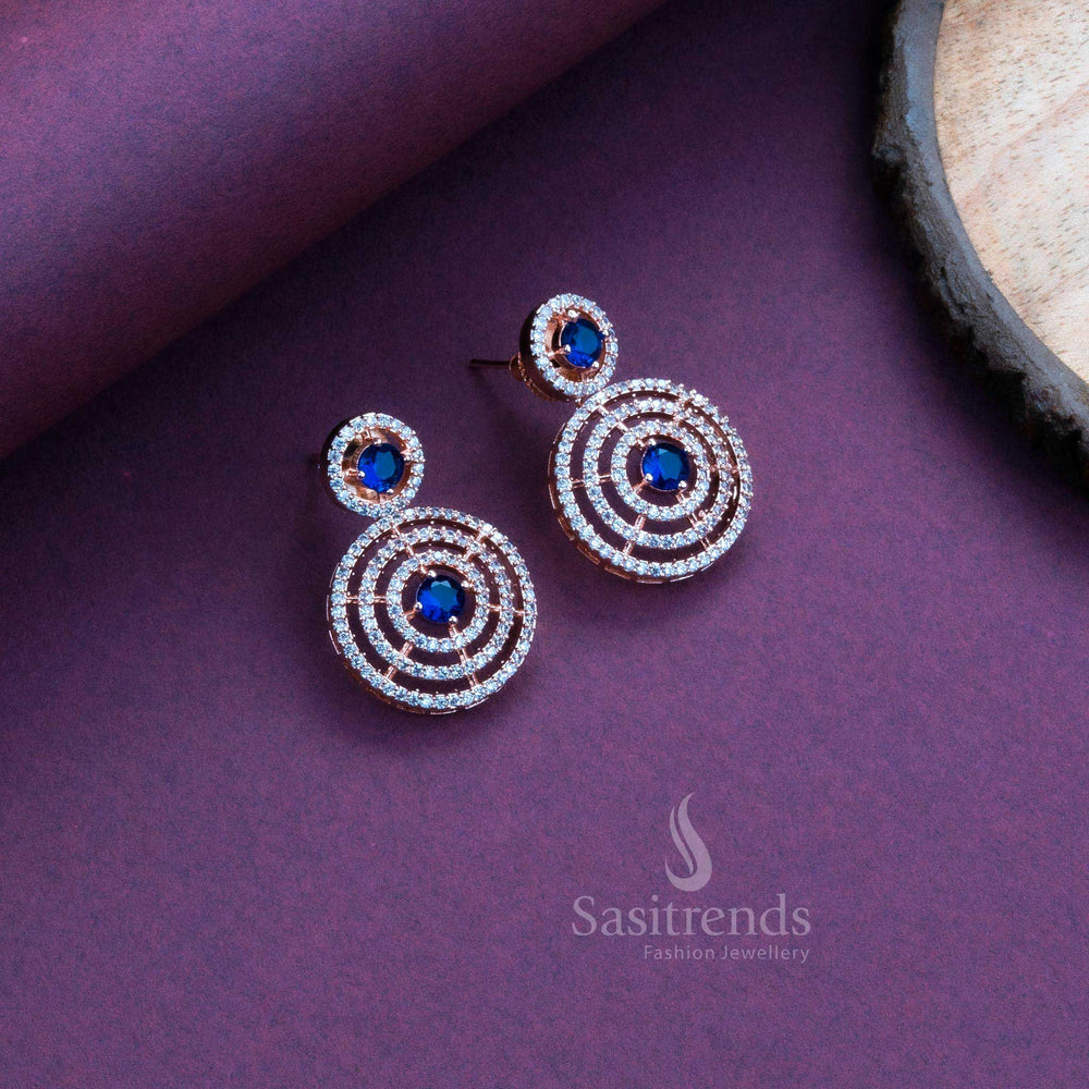 Royal blue American diamond circle studs in rose gold, designed for desi party glam and high-style jewellery ensembles – Sasitrends