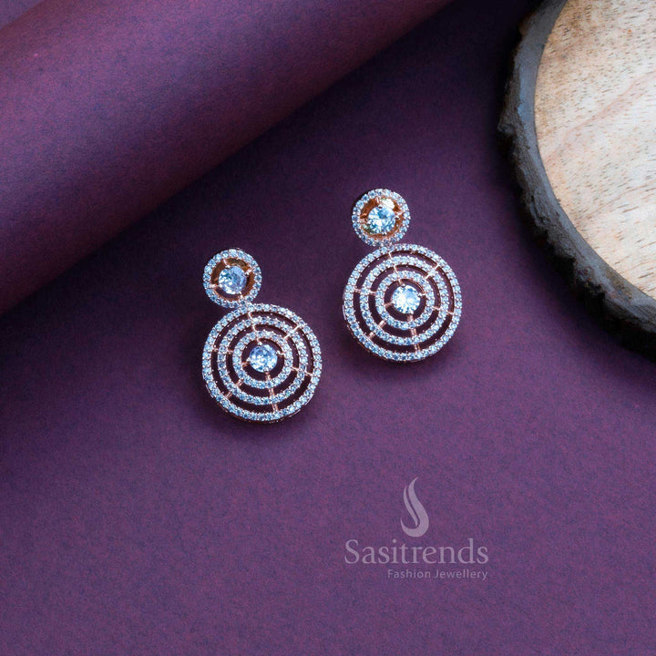 Glamorous white American diamond circle earrings in rose gold, perfect for party wear and elegant saree jewellery styling – Sasitrends