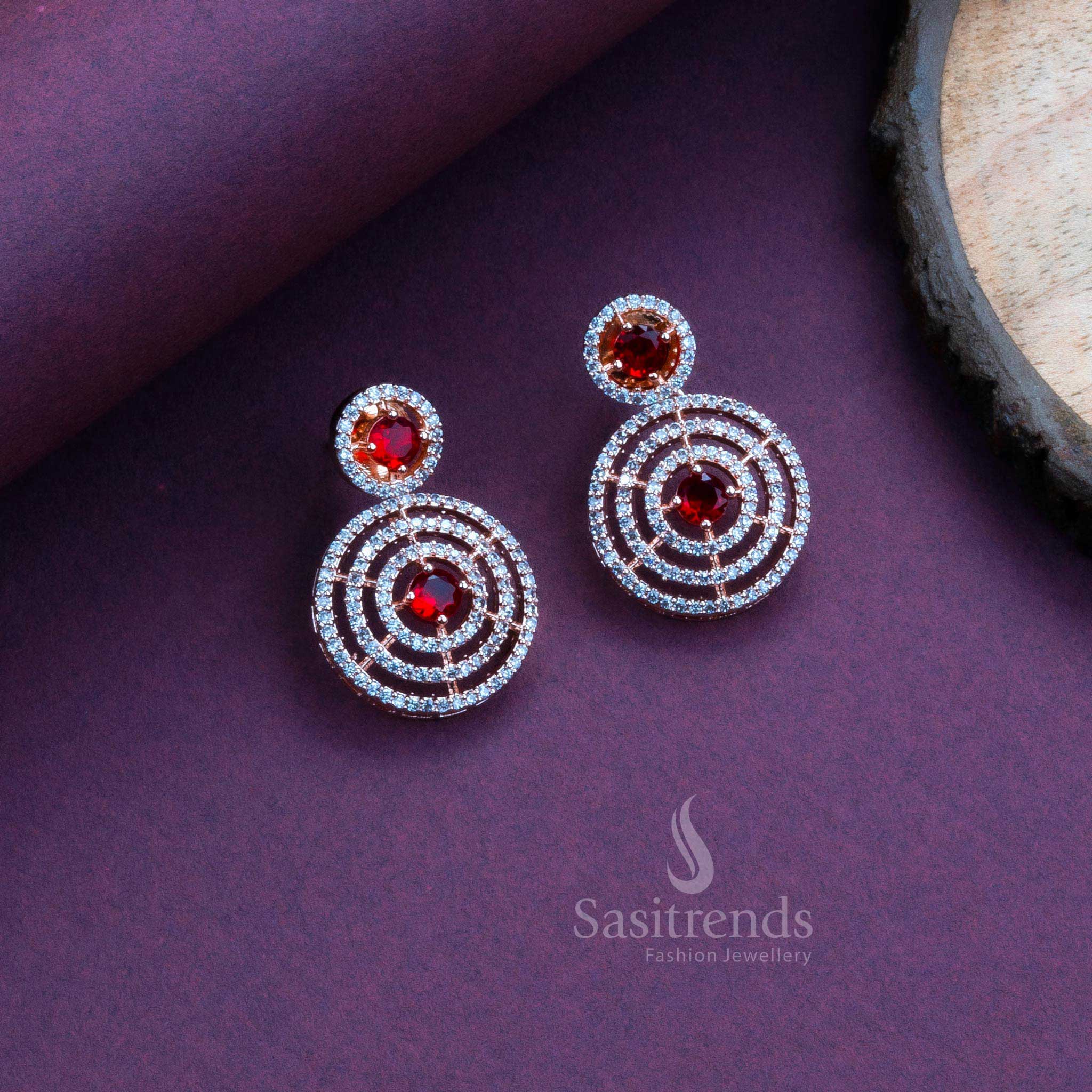 Deep red rose gold plated party earrings in a circle shape, accented with AD sparkle for ethnic style jewellery – Sasitrends