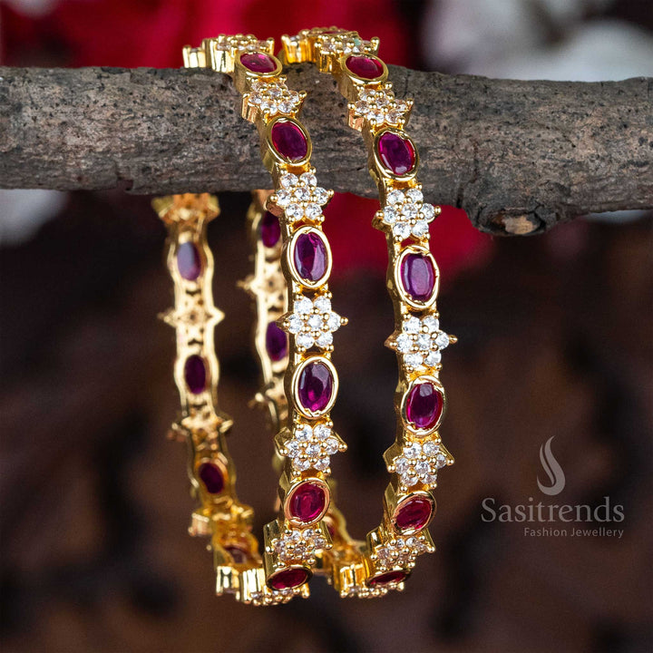 Grand white-ruby floral motif bangles pair with a micro gold plated finish and brilliant American diamond stonework, crafted exclusively for brides - Sasitrends