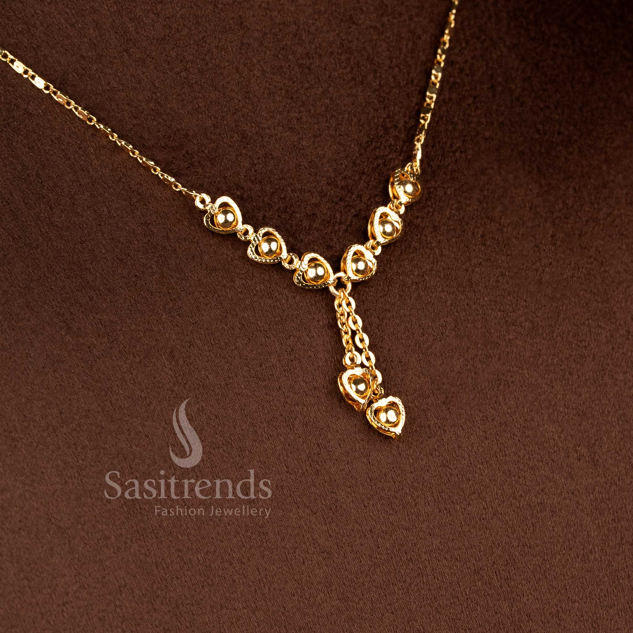 Elegant heart charm Y-drop necklace with cascading golden heart details - Sasitrends