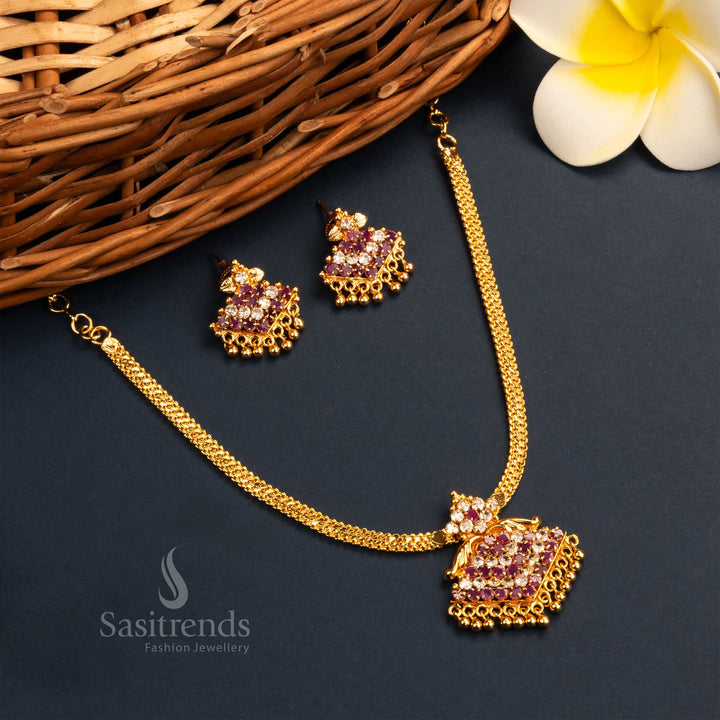 Mesmerizing radiant Kerala style micro gold plated ruby-white floral pendant festive necklace set with earrings, decorated with artistic motifs and dazzling accents - Sasitrends