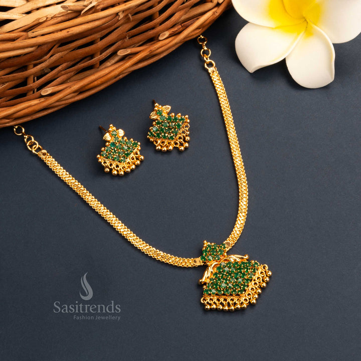 Beautiful divine Kerala style micro gold plated green floral pendant prosperity necklace set with earrings, symbolizing elegance and prosperity with golden ball accents - Sasitrends
