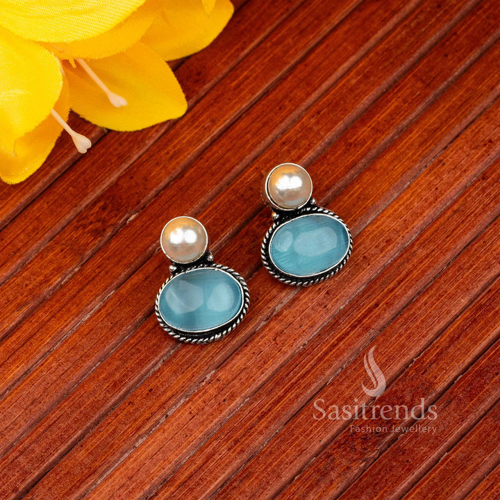 Charming sky-blue oval Monalisa stone stud earrings in oxidised German silver – Serene Silver Hues – Sasitrends