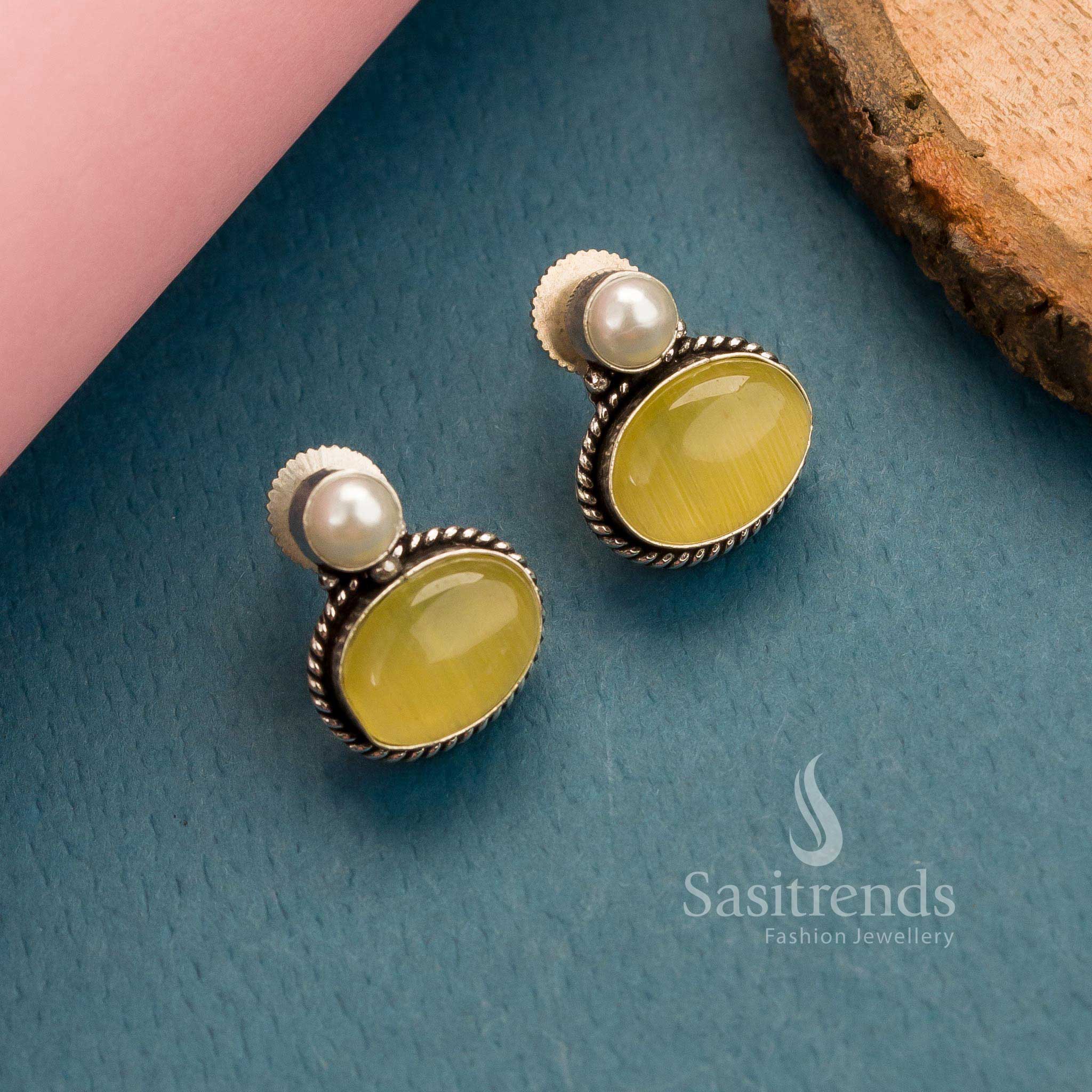Radiant lemon-yellow oval Monalisa stone stud earrings in oxidised German silver – Heritage Shine With Modern Appeal – Sasitrends