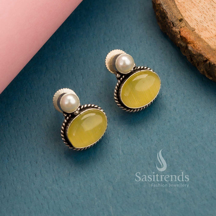 Radiant lemon-yellow oval Monalisa stone stud earrings in oxidised German silver – Heritage Shine With Modern Appeal – Sasitrends