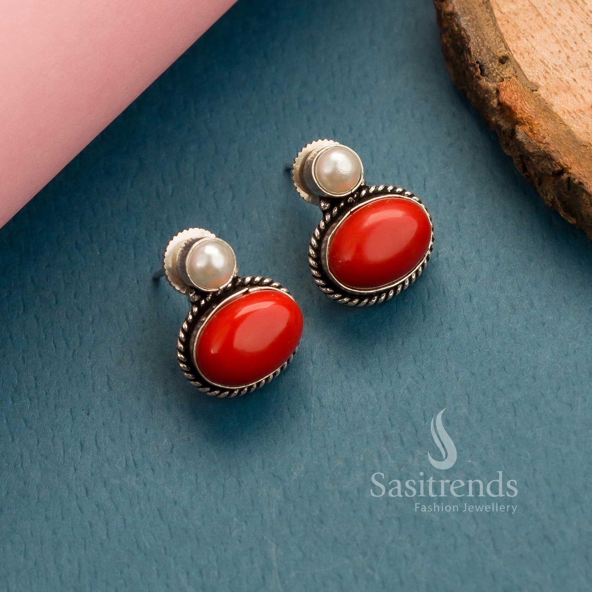 Traditional red oval Monalisa stone stud earrings in oxidised German silver – Oxidised Brilliance Design – Sasitrends