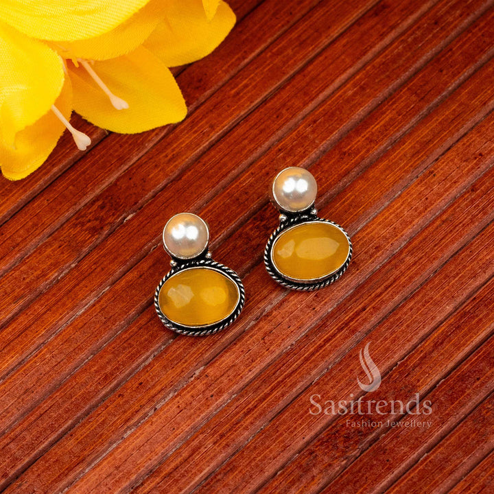 Vibrant yellow oval Monalisa stone stud earrings in oxidised German silver – Ornamental Silver Shine – Sasitrends