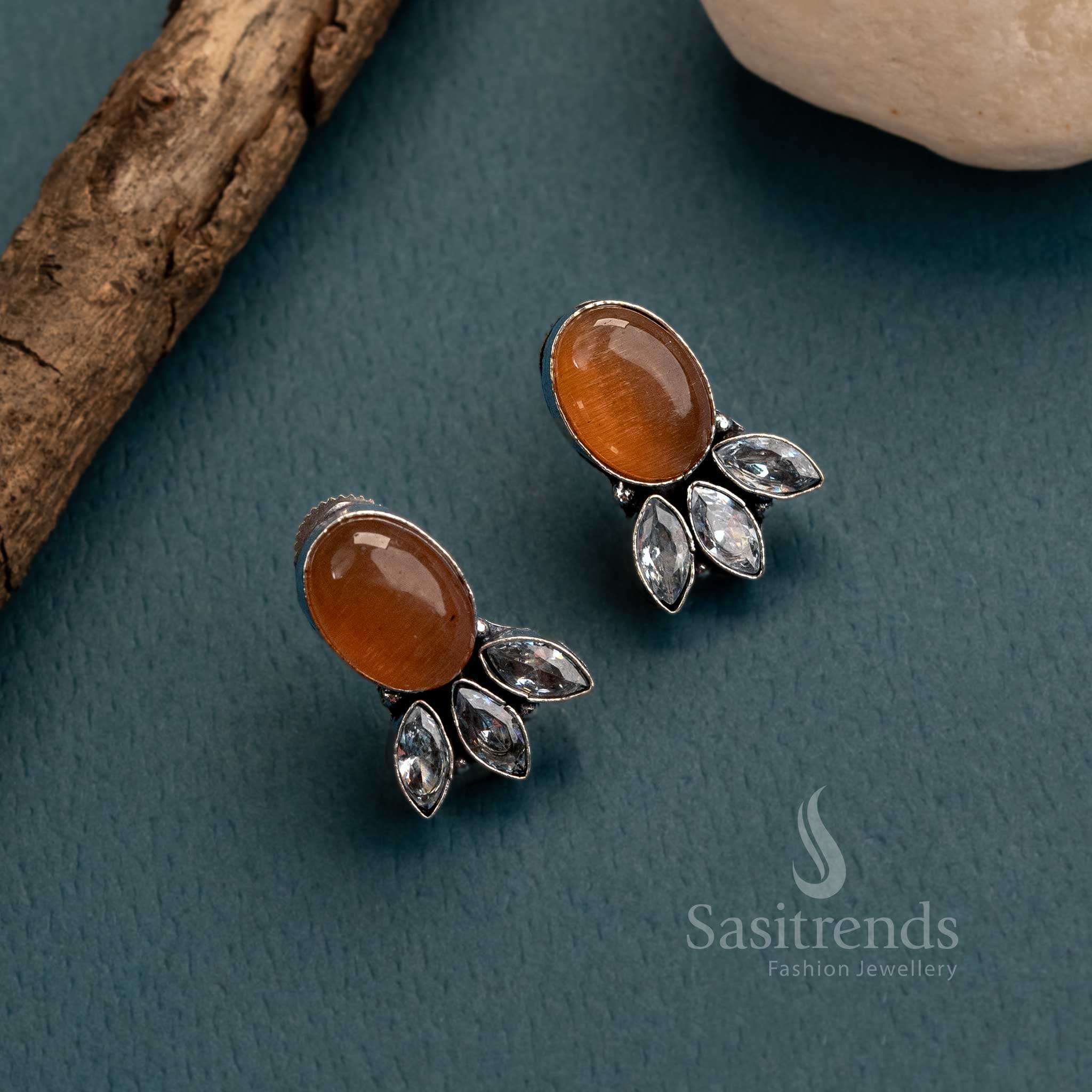 Soft peach toned oxidised earrings with Monalisa stones and shimmering AD work – elegant traditional jewellery for celebrations – Sasitrends