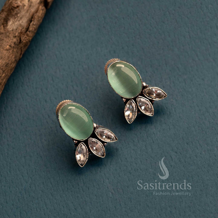 Refreshing mint green Monalisa stone earrings in oxidised German silver with AD details – cultural jewellery with an elegant twist – Sasitrends