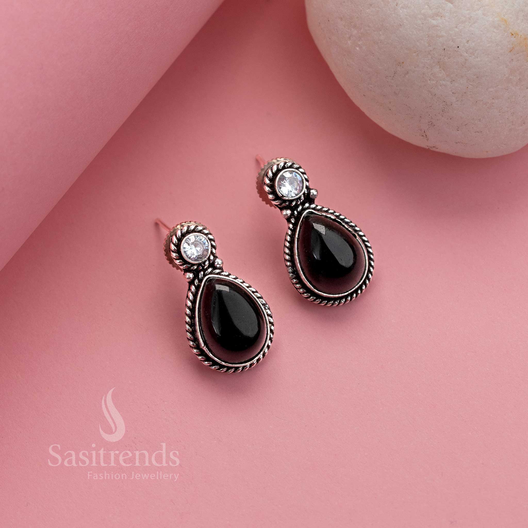 Oxidized German Silver Earrings with Monalisa and AD Stones