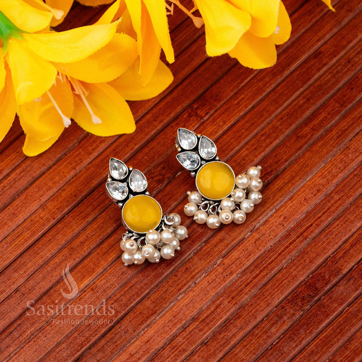 Sunlit yellow oxidised silver earrings featuring Monalisa stone, radiant AD sparkle and soft pearl finish – a cheerful jewellery piece by Sasitrends