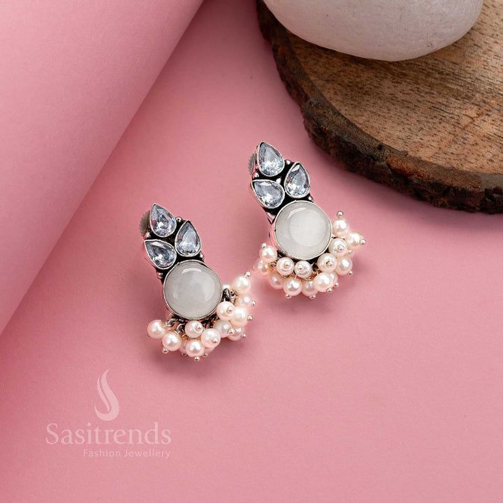 Royal white oxidised German silver earrings with Monalisa centrepiece, American diamonds and pearl drops – perfect festive jewellery from Sasitrends
