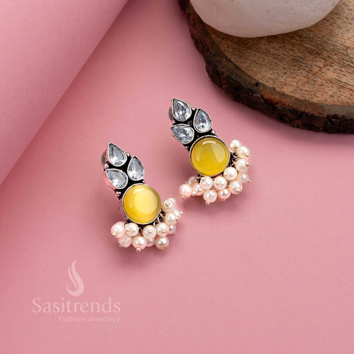 Golden yellow oxidised German silver earrings with Monalisa gem, bright AD shine and pearl hangings – vibrant festive jewellery by Sasitrends