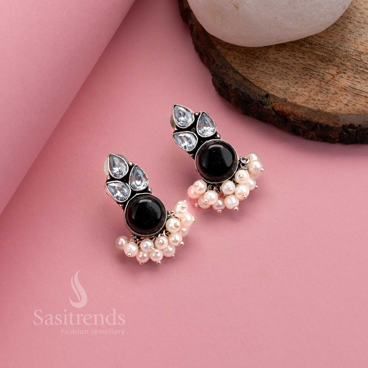 Elegant traditional black oxidised German silver earrings with Monalisa stone, dazzling AD accents and pearl drops – statement designer jewellery by Sasitrends