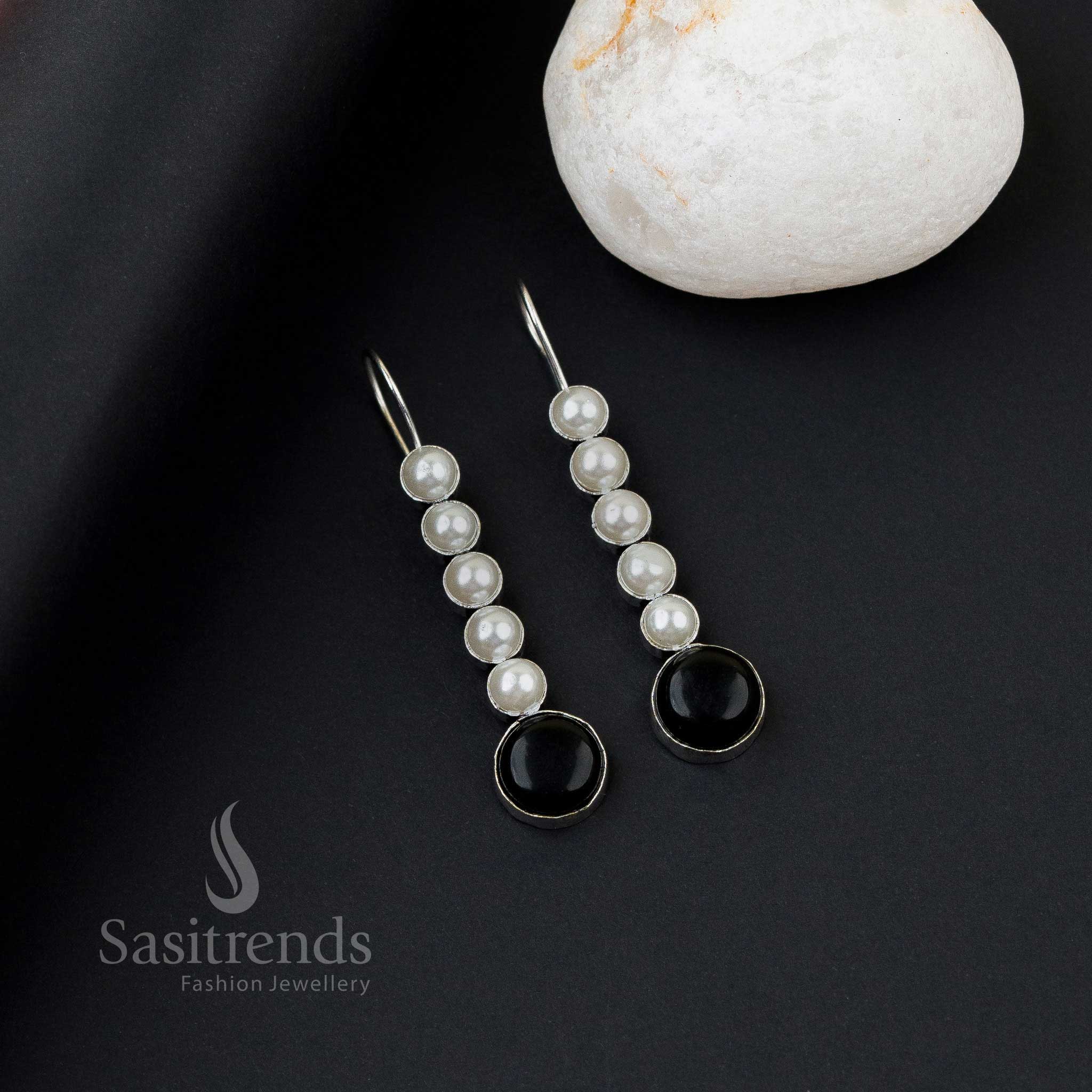 Radiant black oxidised silver earrings with five pearl line, Monalisa stones and captivating twist glow – perfect office wear jewellery by Sasitrends