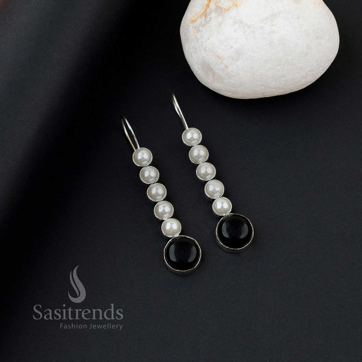 Radiant black oxidised silver earrings with five pearl line, Monalisa stones and captivating twist glow – perfect office wear jewellery by Sasitrends