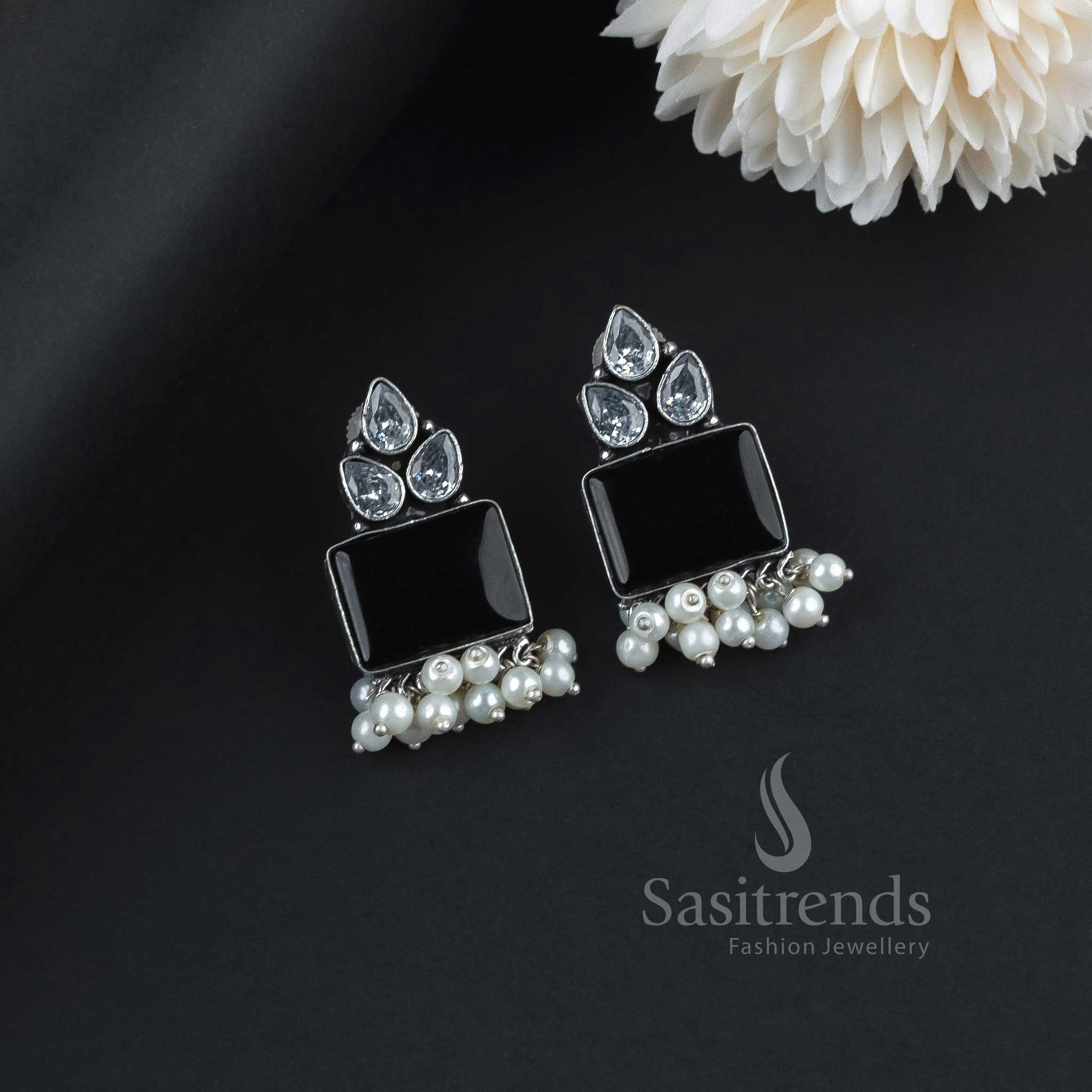 Captivating Black Oxidised German Silver Earrings Embellished With AD Stones, Lustrous Monalisa Gems And Graceful Pearl Hangings – A Traditional Royal Jewellery Piece - Sasitrends