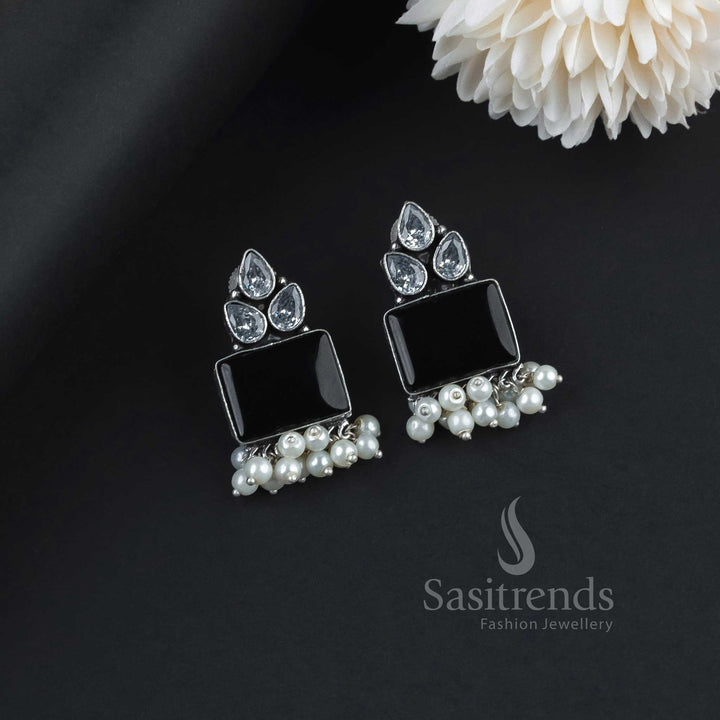 Captivating Black Oxidised German Silver Earrings Embellished With AD Stones, Lustrous Monalisa Gems And Graceful Pearl Hangings – A Traditional Royal Jewellery Piece - Sasitrends
