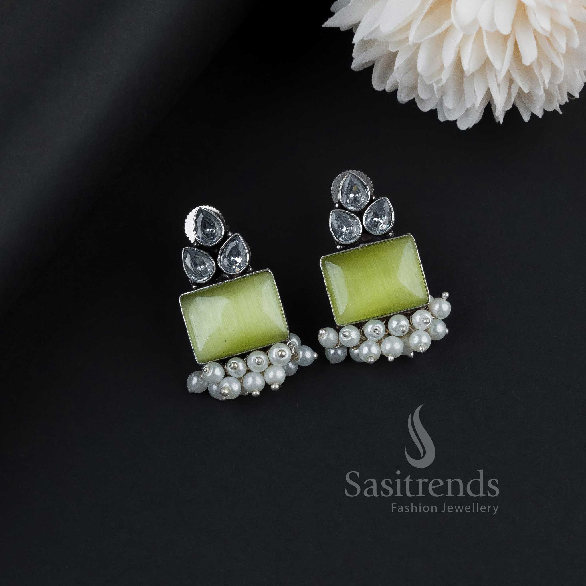 Stylish Mint Green Oxidised German Silver Earrings Embellished With Monalisa Gems, Glittering AD Stones And Pearl Drops – A Fusion Fashion Jewellery Marvel - Sasitrends