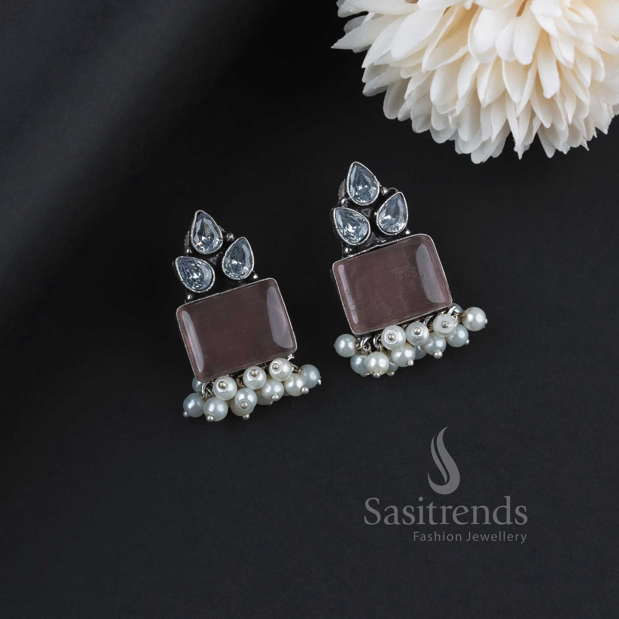 Subtle Peach Oxidised German Silver Earrings With Decorative AD Details, Elegant Monalisa Stones And Dangling Pearls – Casual Chic Jewellery For Graceful Looks - Sasitrends