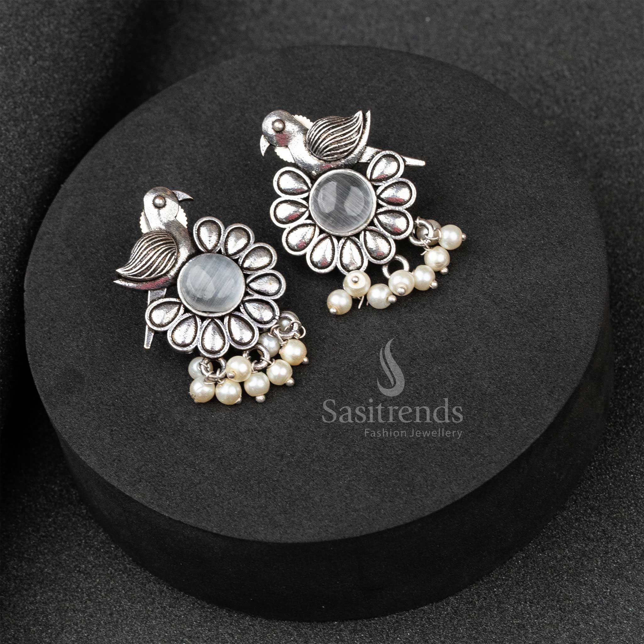 Elegant White Oxidised German Silver Earrings Featuring Floral Carving With Monalisa Glow And Dangling Pearls – A Classical Jewellery Treasure - Sasitrends