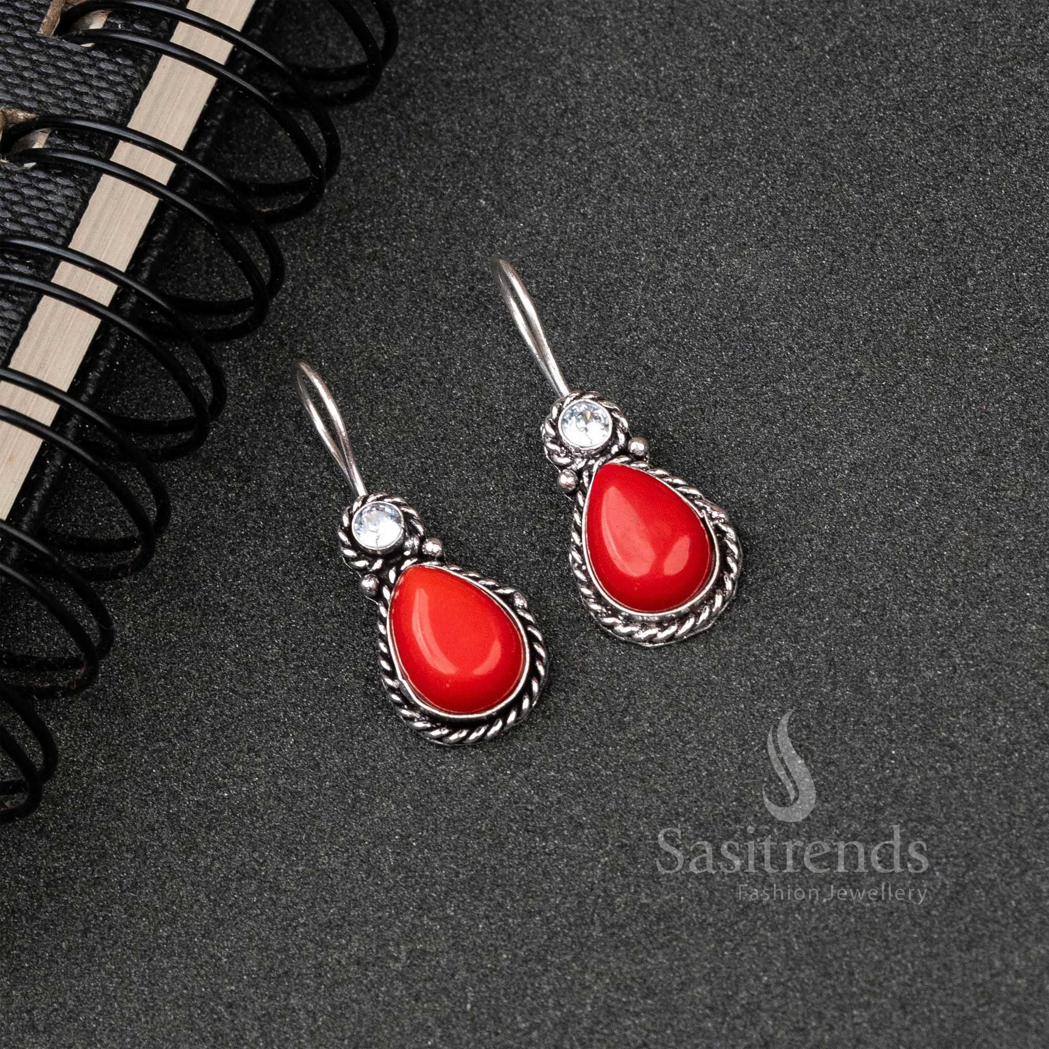 Passionate Red Oxidised Silver Water Drop Earrings Accented With Monalisa And Sparkly AD Stones – A Traditional Charm Jewellery Highlight - Sasitrends