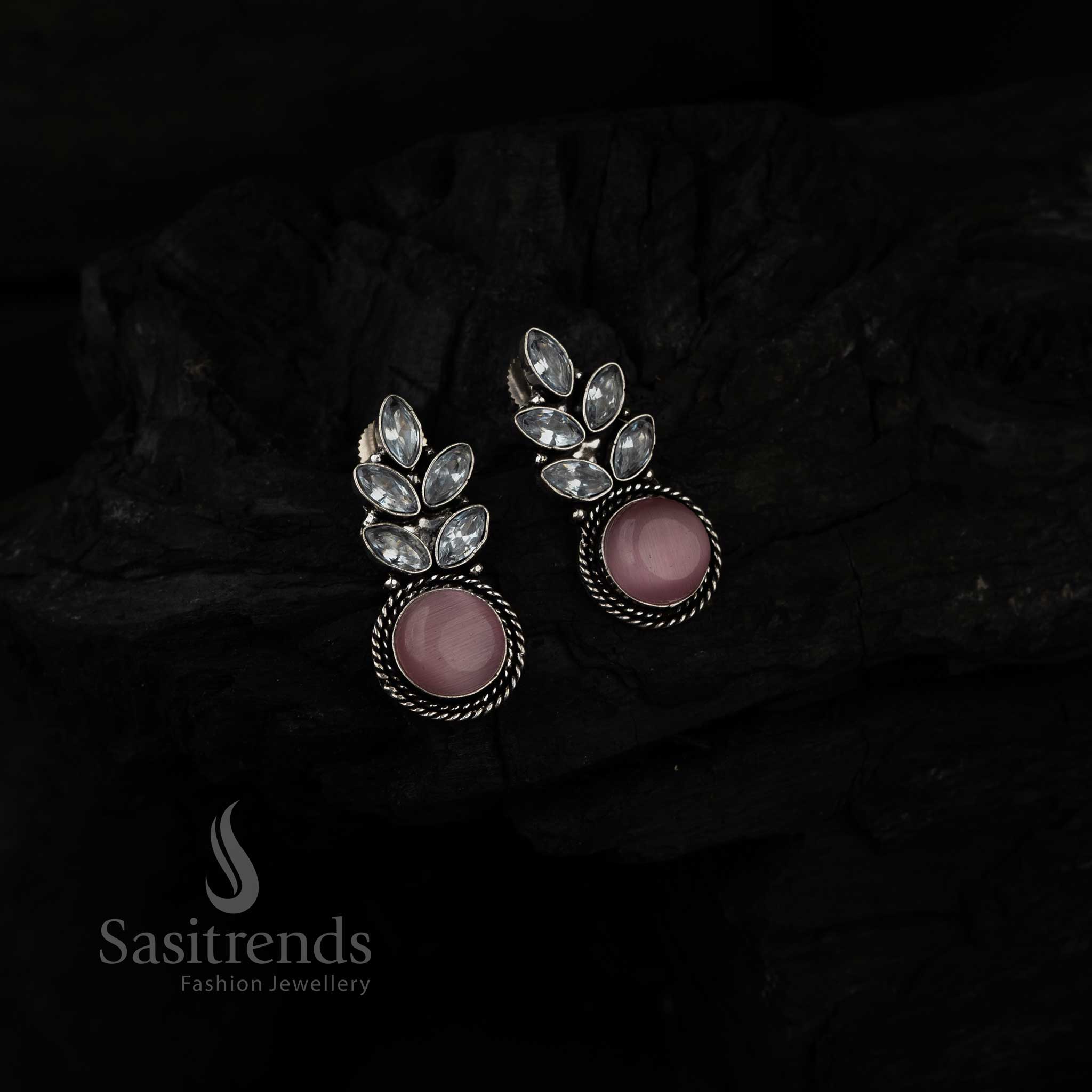 Radiant Pink Monalisa Stone Earrings In Leaf Design Featuring Oxidised Silver And Shiny AD Stones – Elegant Fusion Wear Jewellery By Sasitrends