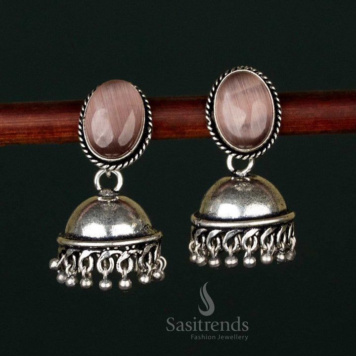 Vintage Oxidised Silver Jhumka Earrings – A heritage-inspired jewellery creation featuring intricate carvings and lustrous oval brown Monalisa stones - Sasitrends