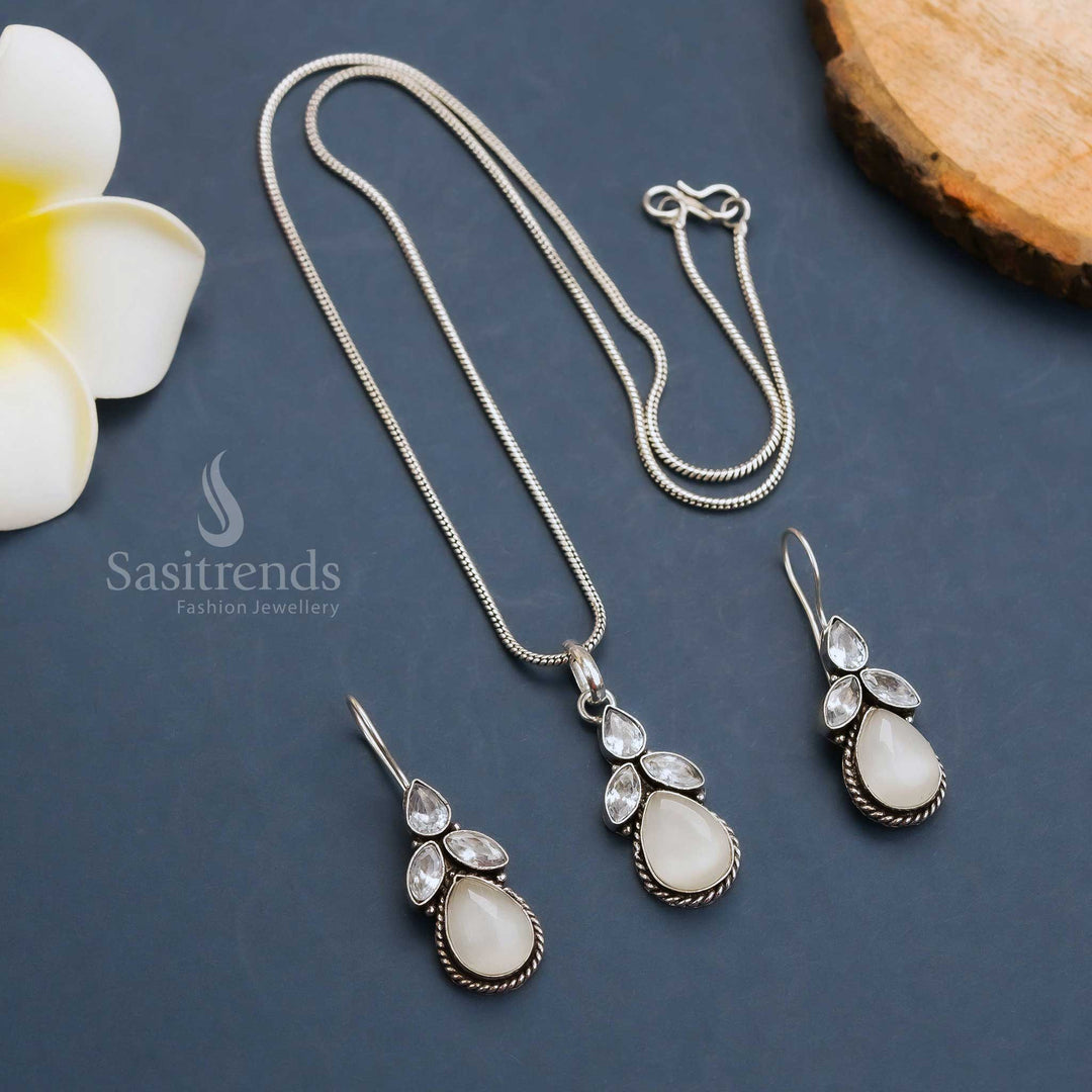 Elegant white oxidised floral pendant necklace with shimmering Monalisa and AD stones, completed with graceful hook earrings – perfect traditional wear jewellery – Sasitrends