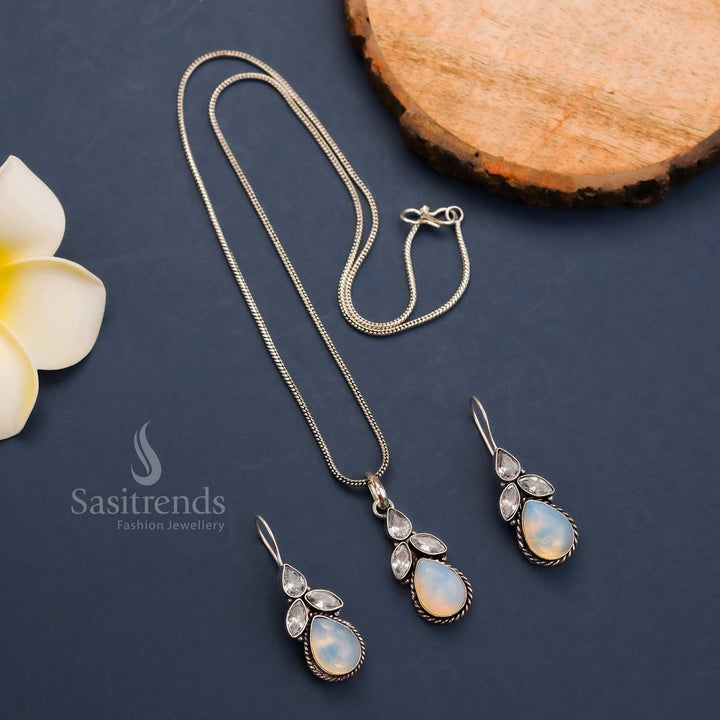 Ethereal moon-white oxidised jewellery set with floral pendant in Monalisa and AD stone elegance – matching earrings – Sasitrends
